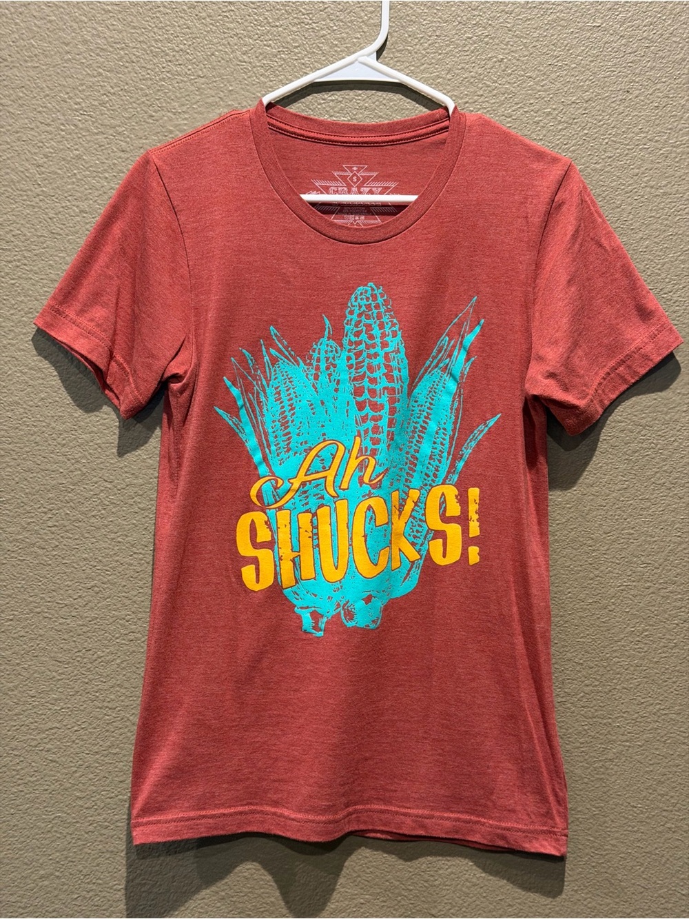 Crazy Train 'Ah Shucks!' Graphic Tee - Rust with Teal & Yellow